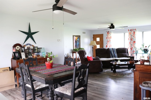 dining room featuring hardwood / wood-style floors and ceiling fan