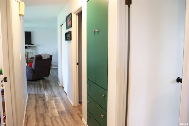 hallway featuring light hardwood / wood-style flooring