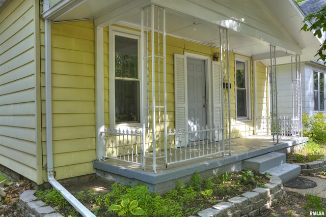 entrance to property with a porch