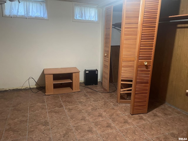 basement with tile floors