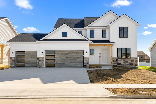 view of front of property with a garage