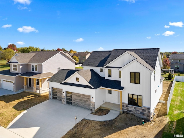 modern farmhouse style home with a garage