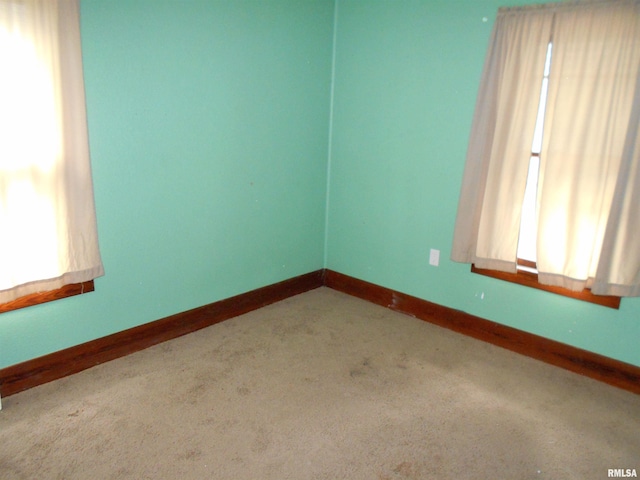 unfurnished room with carpet