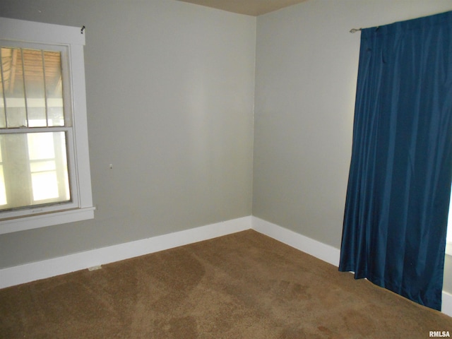 view of carpeted spare room