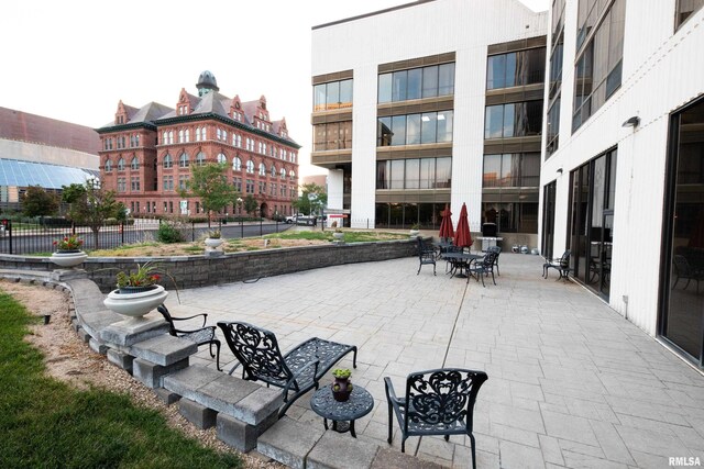 view of property's community with a patio