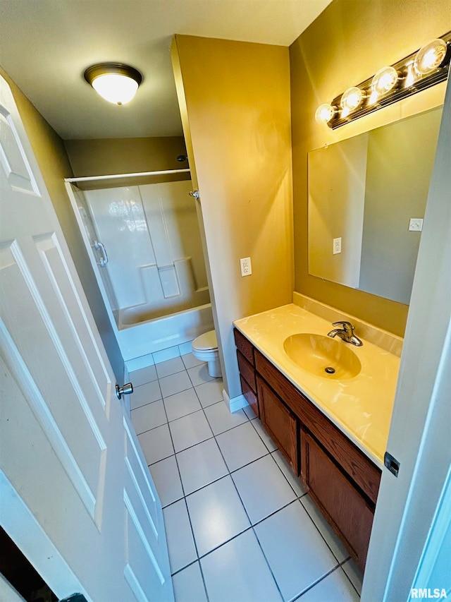 full bathroom with shower / washtub combination, tile patterned flooring, vanity, and toilet