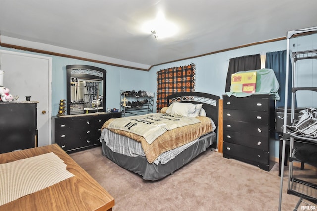 bedroom featuring carpet flooring and ornamental molding