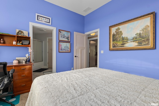 carpeted bedroom featuring visible vents