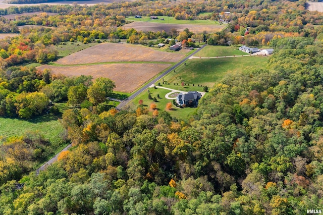 drone / aerial view with a rural view and a wooded view