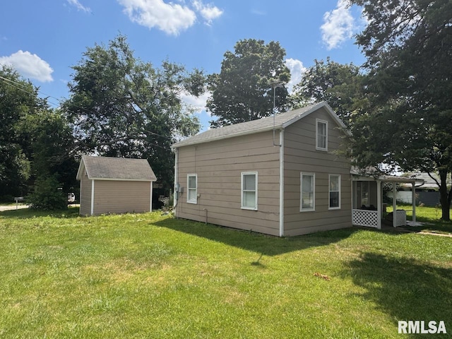 view of property exterior featuring a storage shed and a lawn