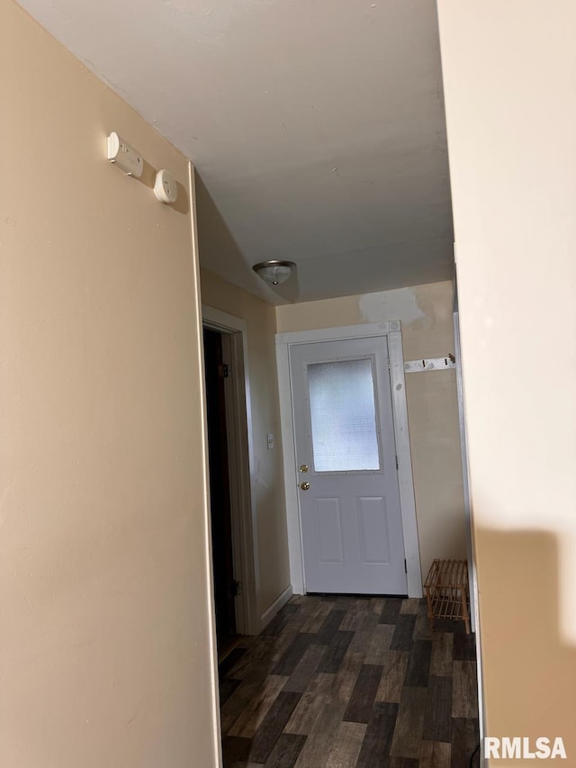 hallway featuring dark hardwood / wood-style floors