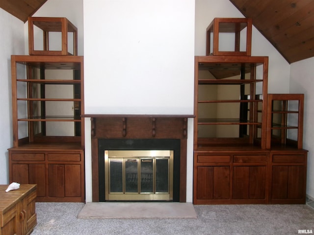 unfurnished living room featuring lofted ceiling, wooden ceiling, and light colored carpet