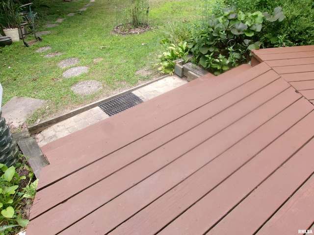 deck featuring a yard