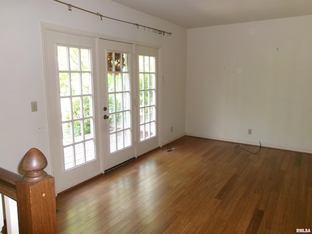 doorway featuring hardwood / wood-style floors