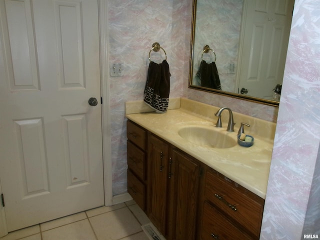 bathroom with vanity and tile patterned flooring