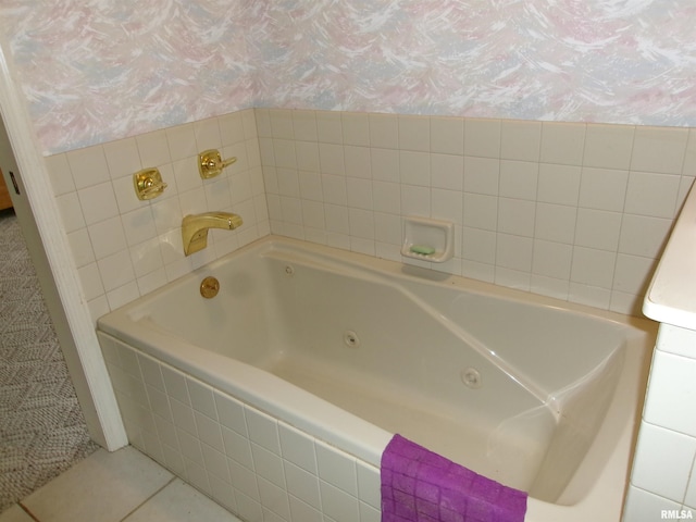 bathroom featuring tiled tub and tile patterned floors