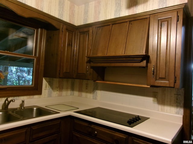 kitchen with sink and black electric cooktop