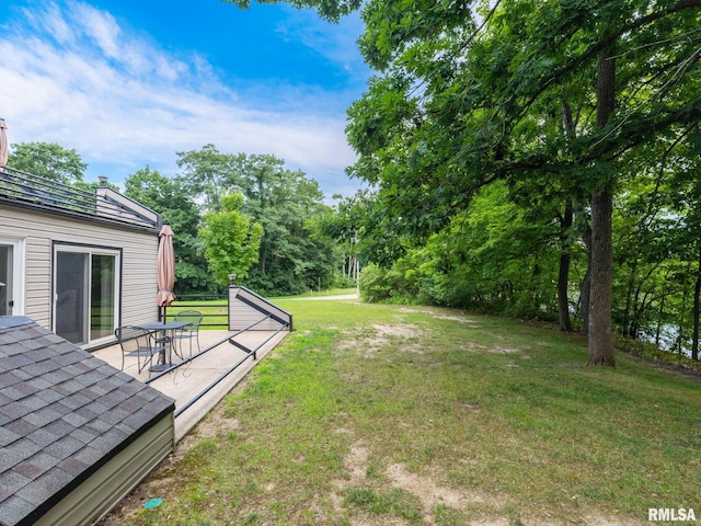 view of yard with a patio area