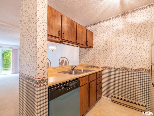 kitchen with dishwasher, light countertops, a baseboard radiator, and a sink