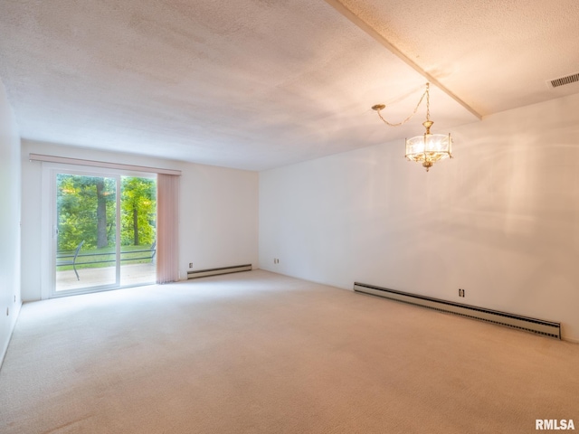 carpeted spare room featuring a notable chandelier, a textured ceiling, and a baseboard heating unit