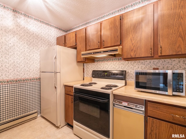 kitchen with a textured ceiling, electric range oven, white refrigerator, a baseboard heating unit, and backsplash