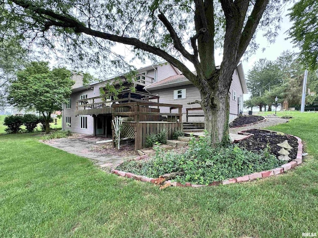 view of yard with a wooden deck