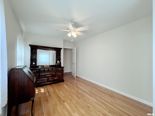 bedroom featuring ceiling fan and light hardwood / wood-style flooring