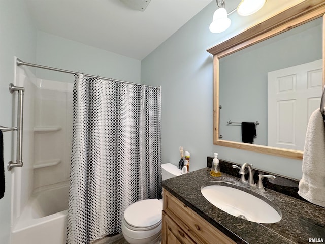 full bathroom featuring vanity, toilet, and shower / bath combination with curtain