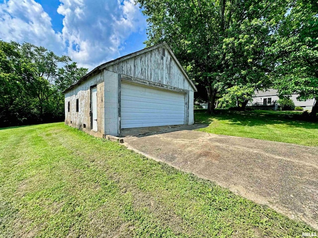 garage with a lawn