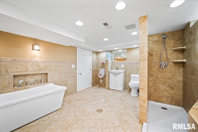 1638 Knox Highway 15, Dahinda, IL 61428 - bathroom featuring tile walls, a soaking tub, toilet, vanity, and tile patterned floors