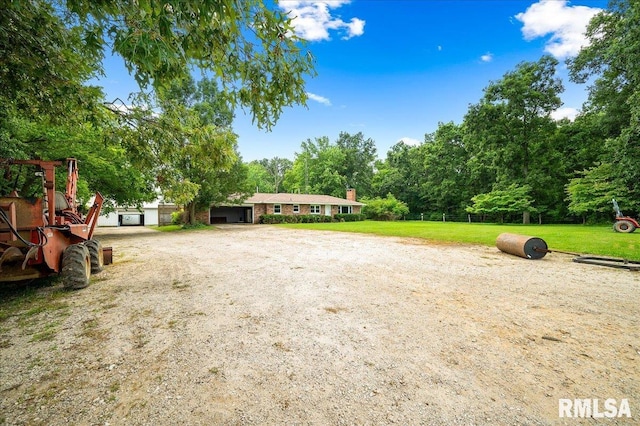 birds eye view of property featuring a rural view