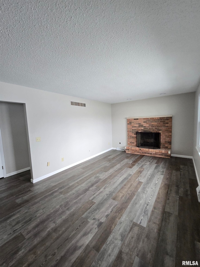 kitchen with sink, backsplash, white dishwasher, a textured ceiling, and light wood-type flooring