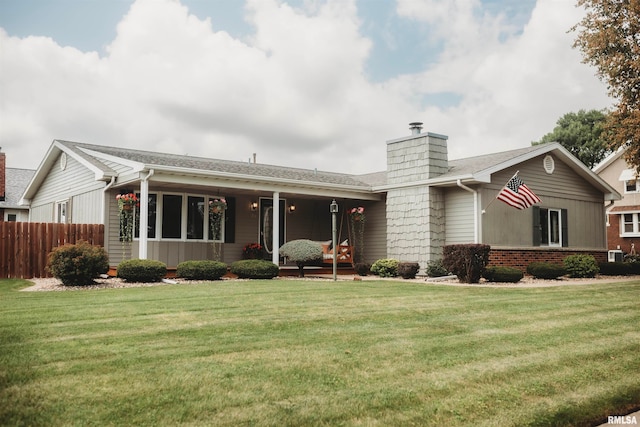 ranch-style house with a front yard