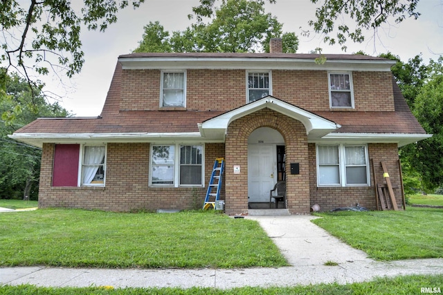 view of front of home featuring a front yard