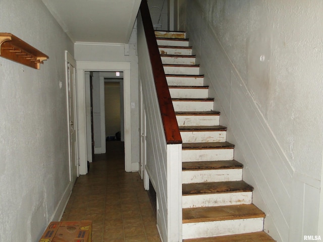 stairway with crown molding