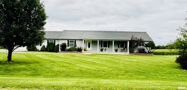 ranch-style home featuring a front yard