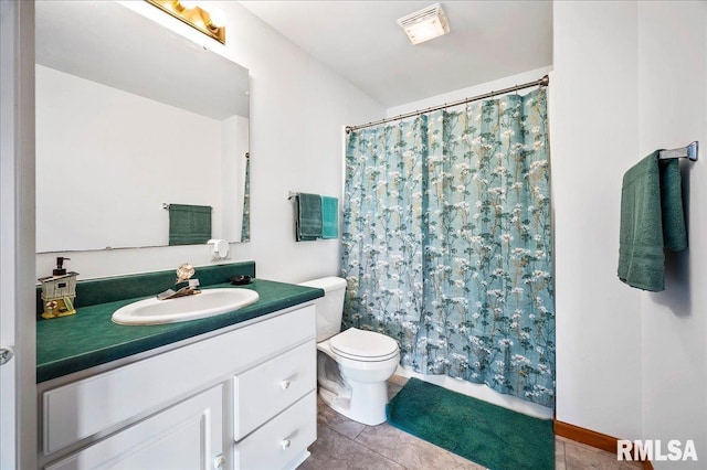 bathroom featuring vanity, curtained shower, tile patterned floors, and toilet