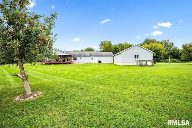 view of yard featuring a sunroom