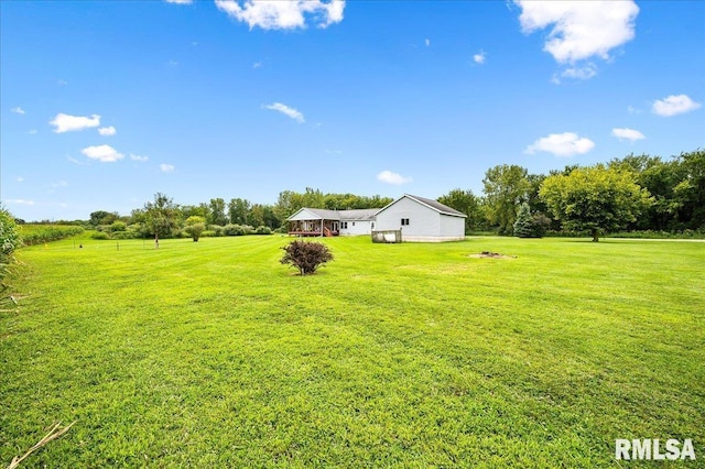 view of yard with a rural view