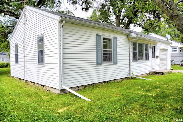 view of property exterior featuring a yard