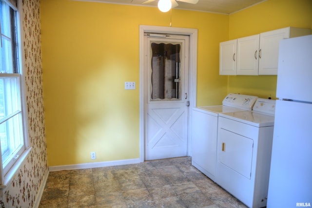 laundry area featuring cabinets, washing machine and dryer, and ceiling fan