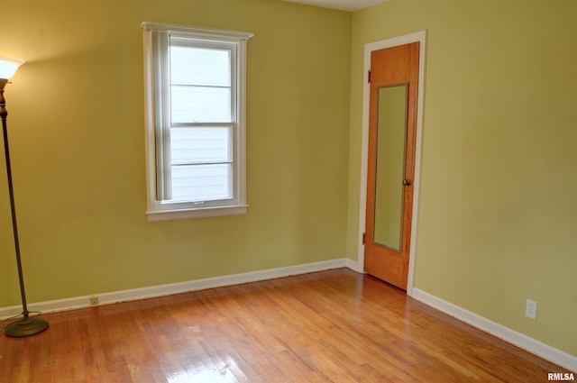 unfurnished room featuring light wood-type flooring