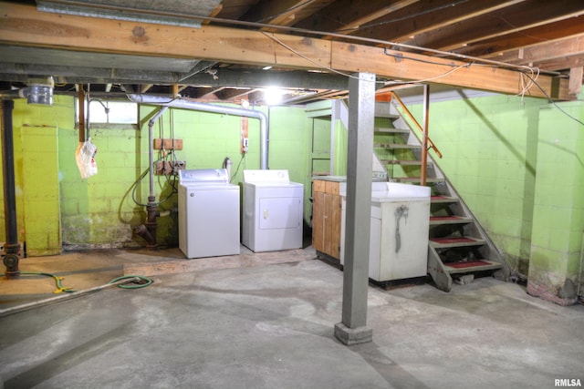 basement featuring washing machine and dryer