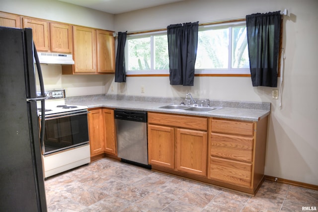 kitchen featuring electric range, dishwasher, sink, light tile patterned flooring, and black fridge