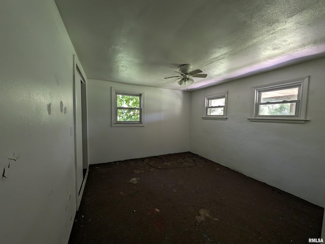 unfurnished room featuring ceiling fan