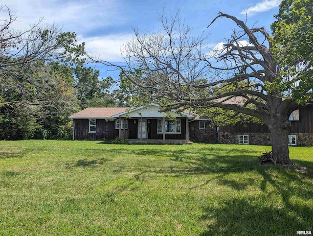 ranch-style house with a front yard