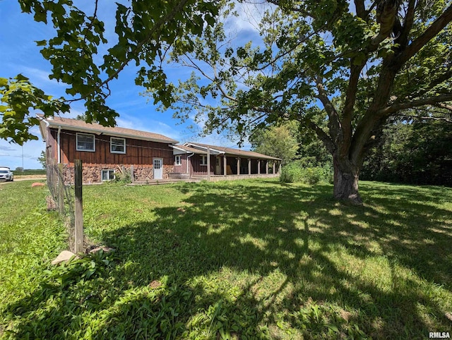 exterior space with a front lawn