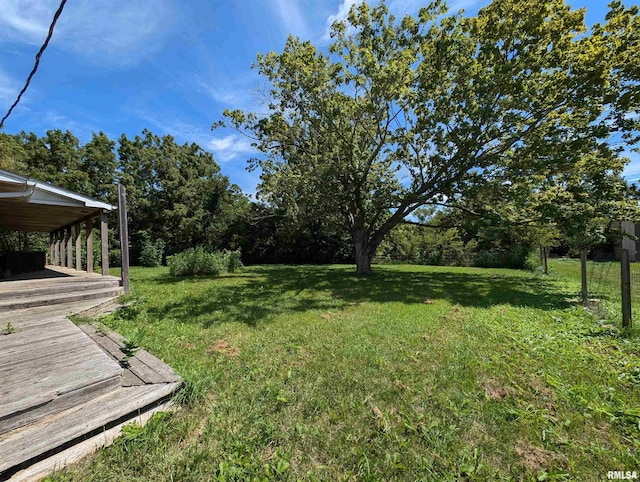 view of yard with a deck