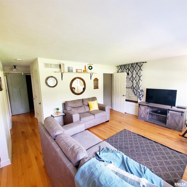 living room featuring hardwood / wood-style flooring