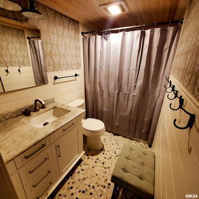 bathroom featuring wood ceiling, vanity, and toilet